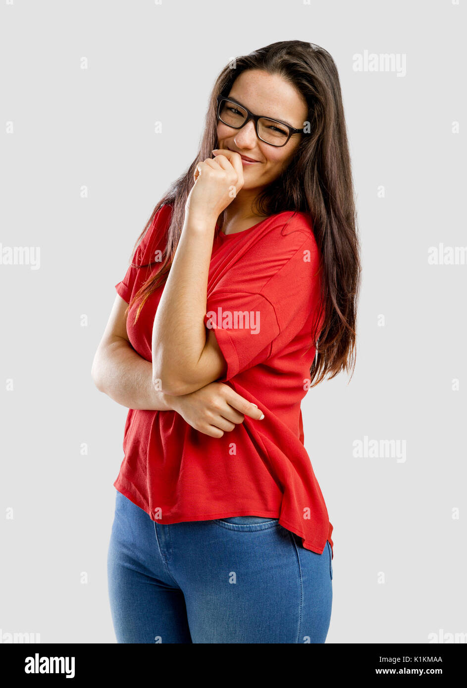Lovely and happy woman with a shy expression Stock Photo
