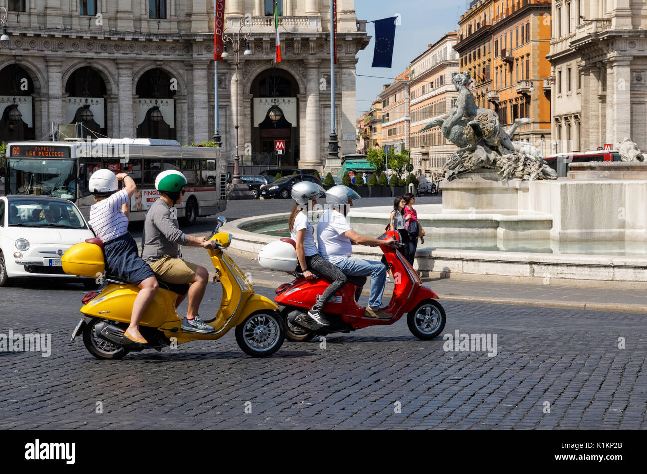 Tourists On Vespa Scooters At The Piazza Della Repubblica In Rome Stock Photo Alamy