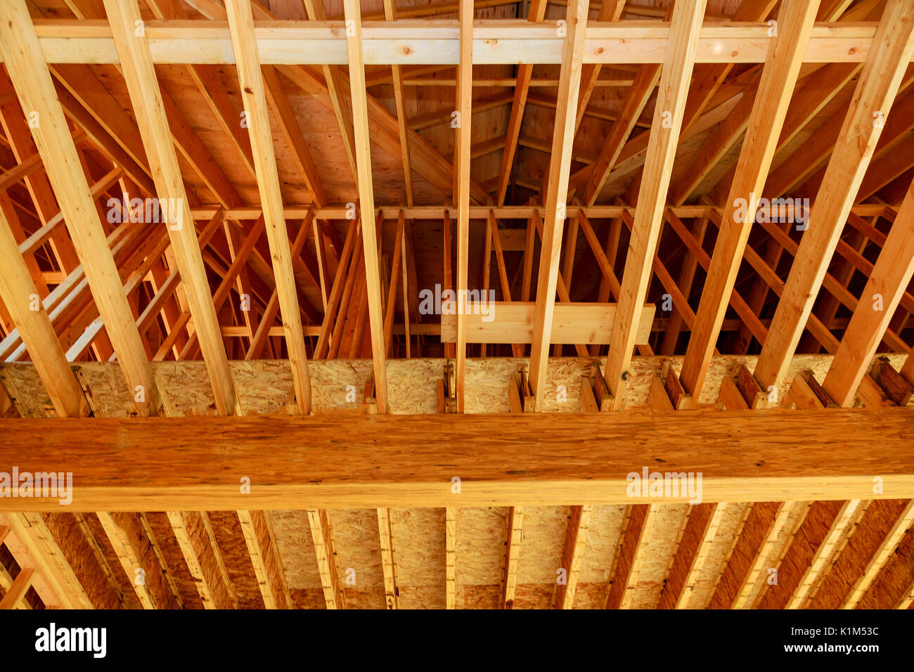 Wood frame residential home under construction. wood framework of new residential home Stock Photo