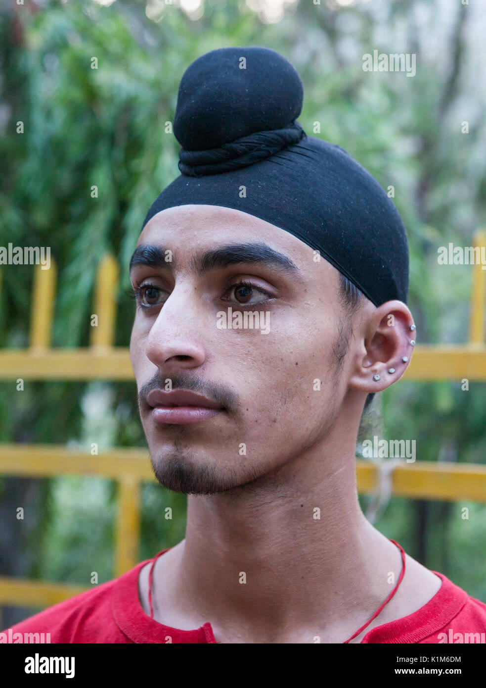 Closeup Portrait Of Beautiful Sikh Boy About The Sikh Gurdwara Stock closeup-portrait-of-beautiful-sikh-boy-about-the-sikh-gurdwara-stock