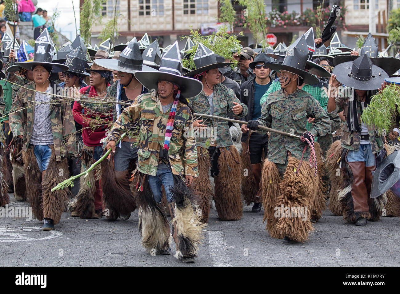June 29, 2017 Cotacachi, Ecuador: kichwa indigenous men wearing chaps