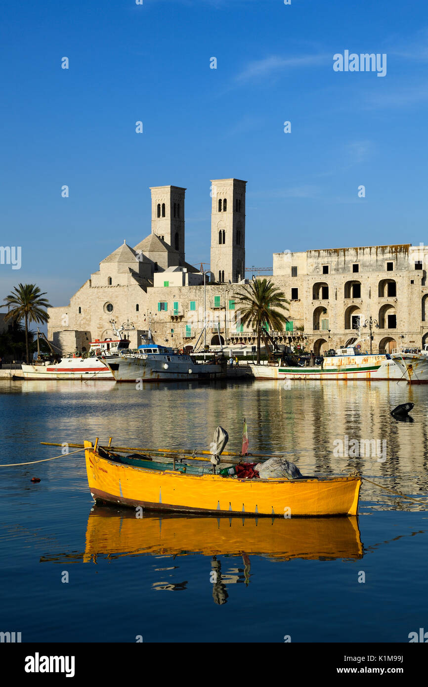 Harbour with old fishing boats, at back cathedral, San Corrado, Molfetta, province of Bari, Apulia, Italy Stock Photo