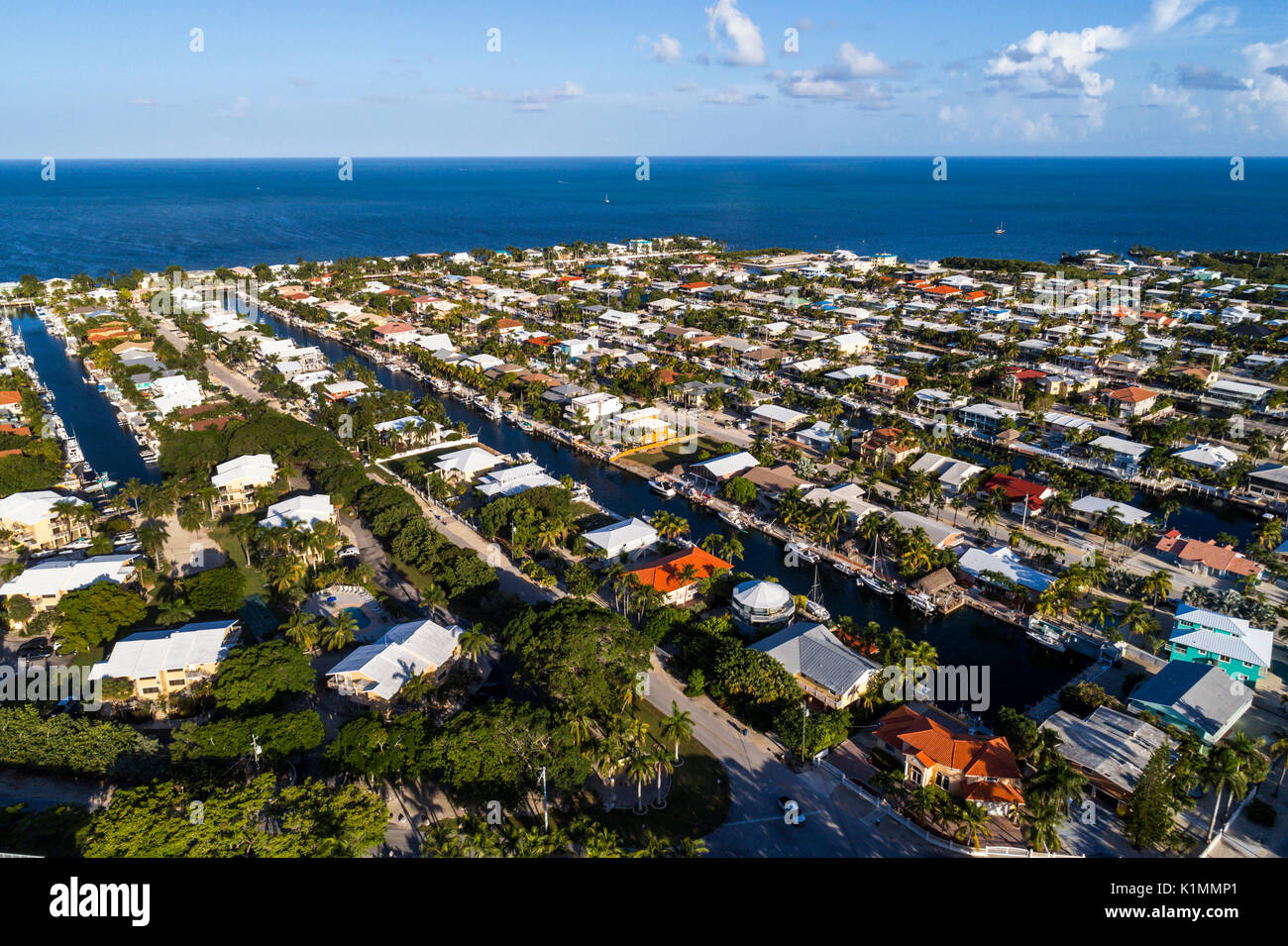 Florida,Florida Keys,Upper,Key Largo,canal,boats,Atlantic Ocean,residences,homes,aerial overhead view,FL17081823D Stock Photo