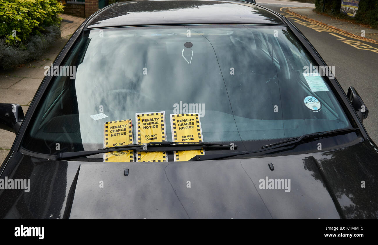 Penalty Charge notices on a car windscreen Stock Photo