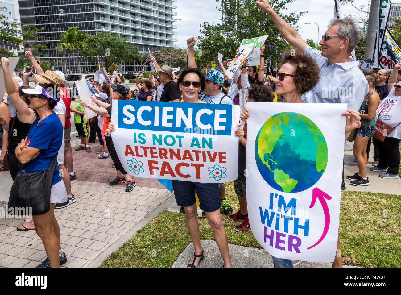 Miami Florida,Museum Park,March for Science,protest,rally,sign,protester,marching,posters,signs,woman female holding,teacher,FL170430150 Stock Photo