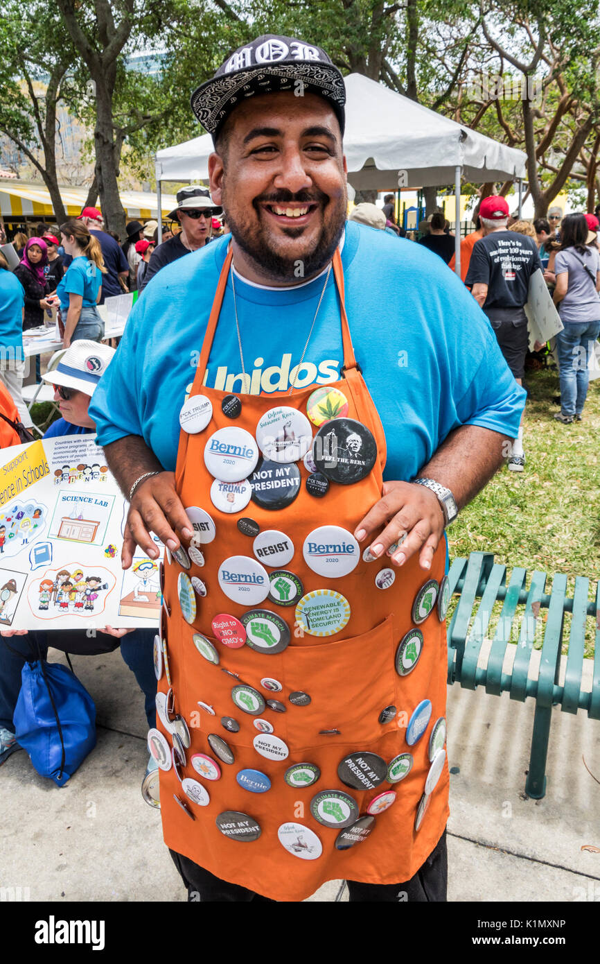 Miami Florida,Downtown,Government Center,March for Science,protest,rally,science expo,Hispanic man men male,selling,political campaign buttons,FL17043 Stock Photo