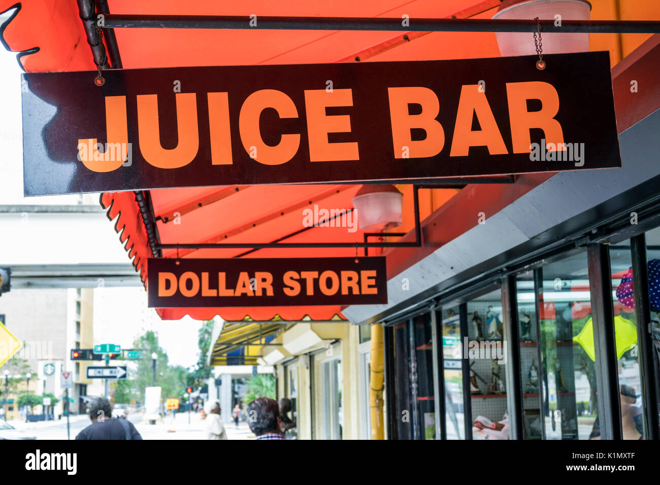 https://c8.alamy.com/comp/K1MXTF/miami-floridadowntownbusiness-signsjuice-bar-barsdollar-storevisitors-K1MXTF.jpg