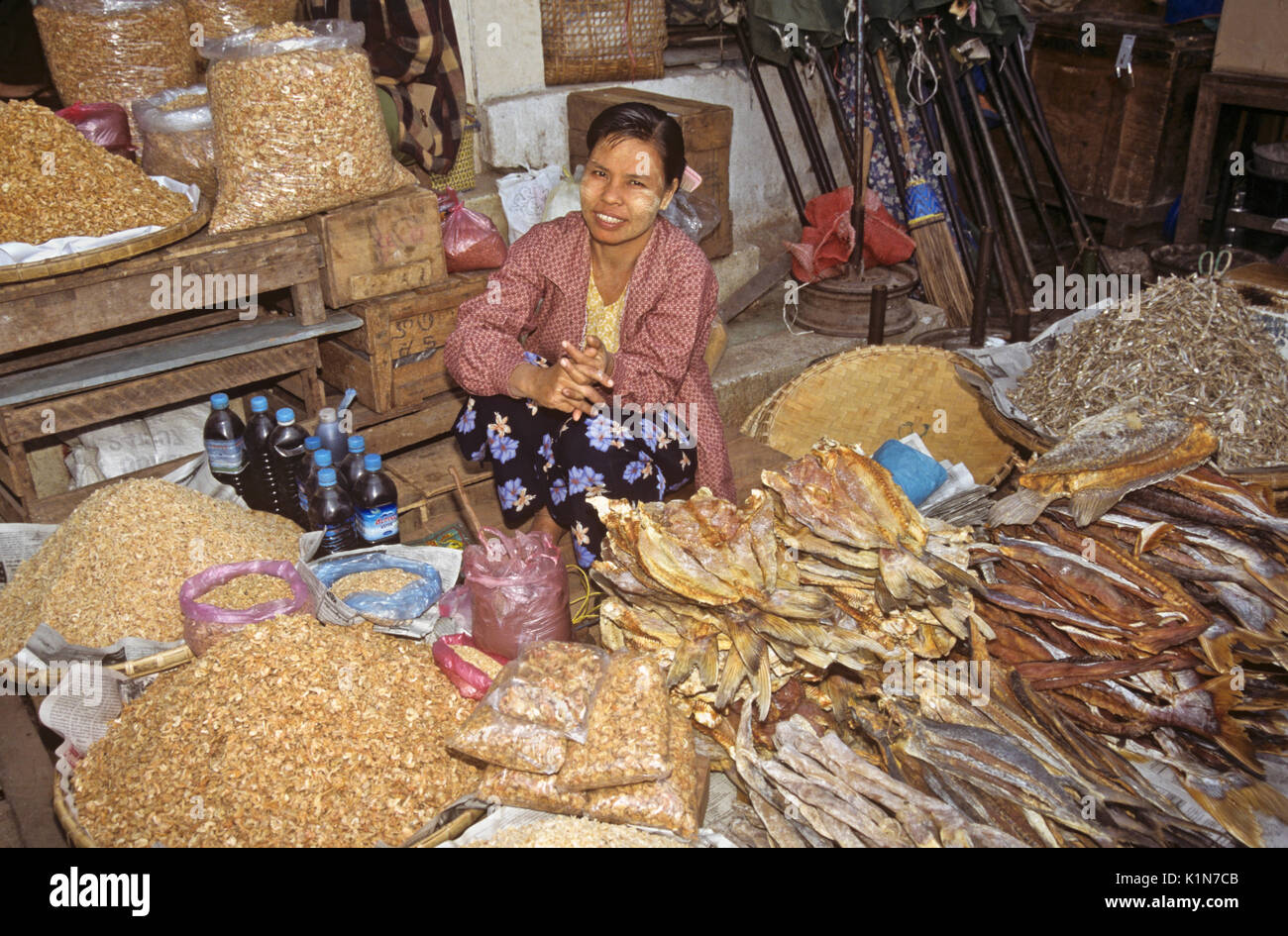Vendor selling dried fish at Zegyo Market, Mandalay, Burma (Myanmar