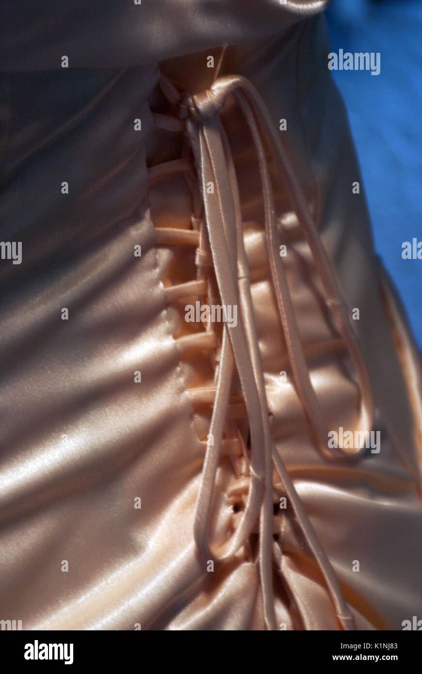 Laced up corset of a gorgeous ivory wedding dress Stock Photo - Alamy