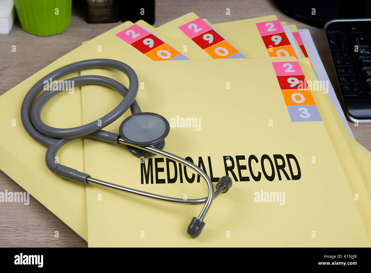 Medical record folders and stethoscope on working desk Stock Photo Alamy