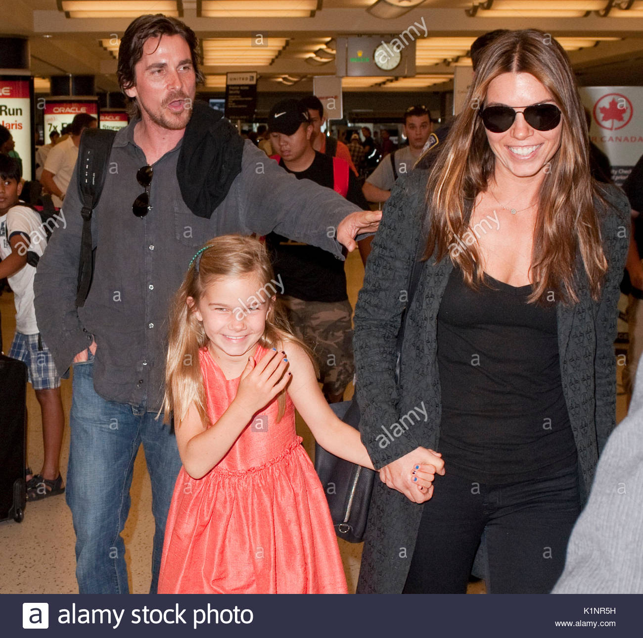 Christian Bale, Sandra Blazic and Emmeline Bale. Christian Bale and