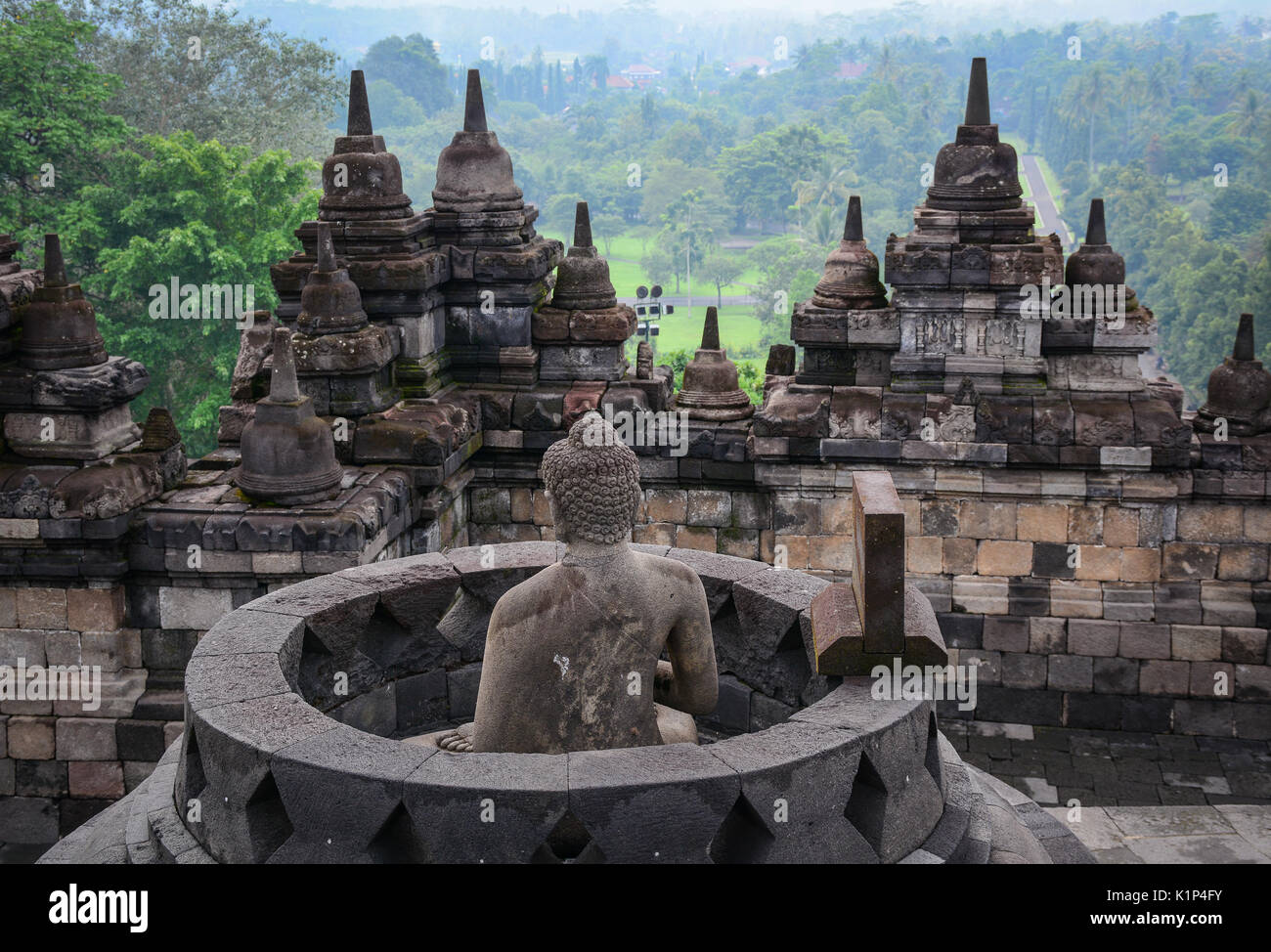 Buddha statue of Borobudur Temple on Java, Indonesia. Borobudur is one ...