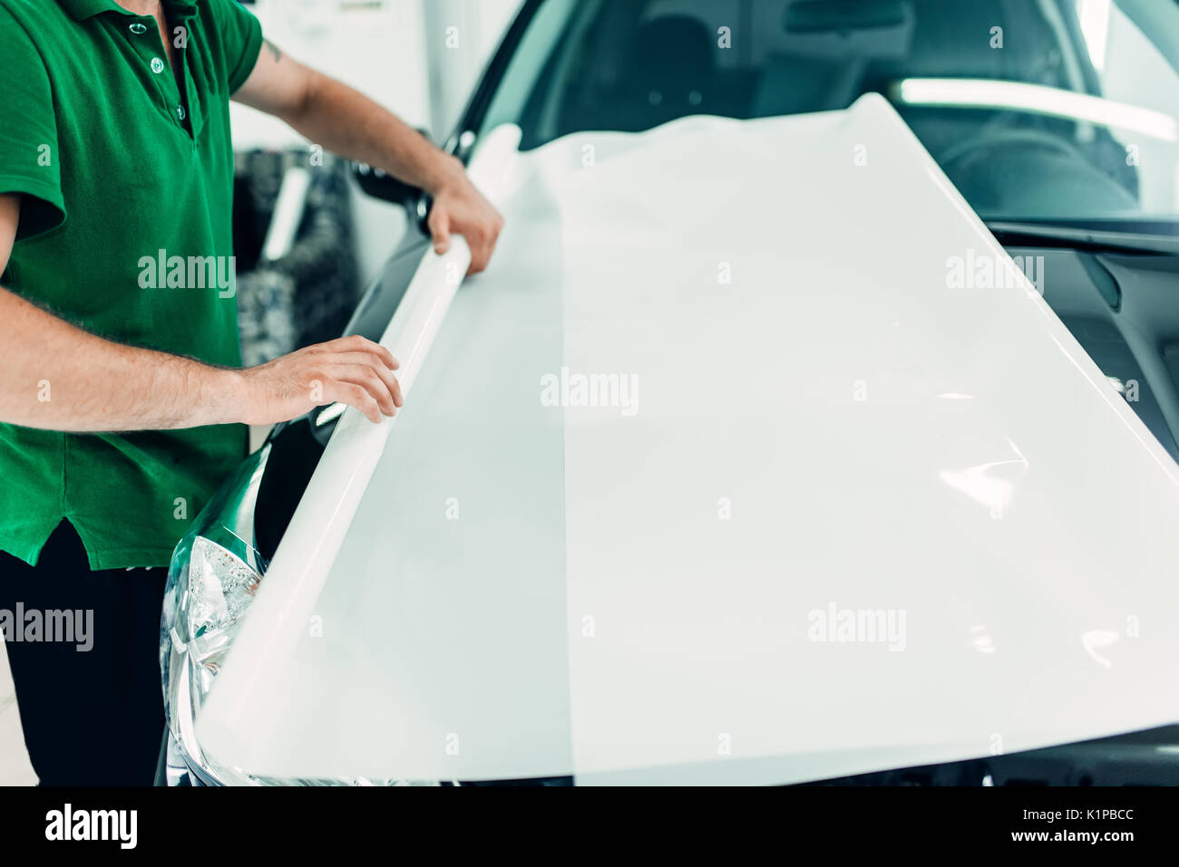 Car paint protection film installation process. Protect against chips