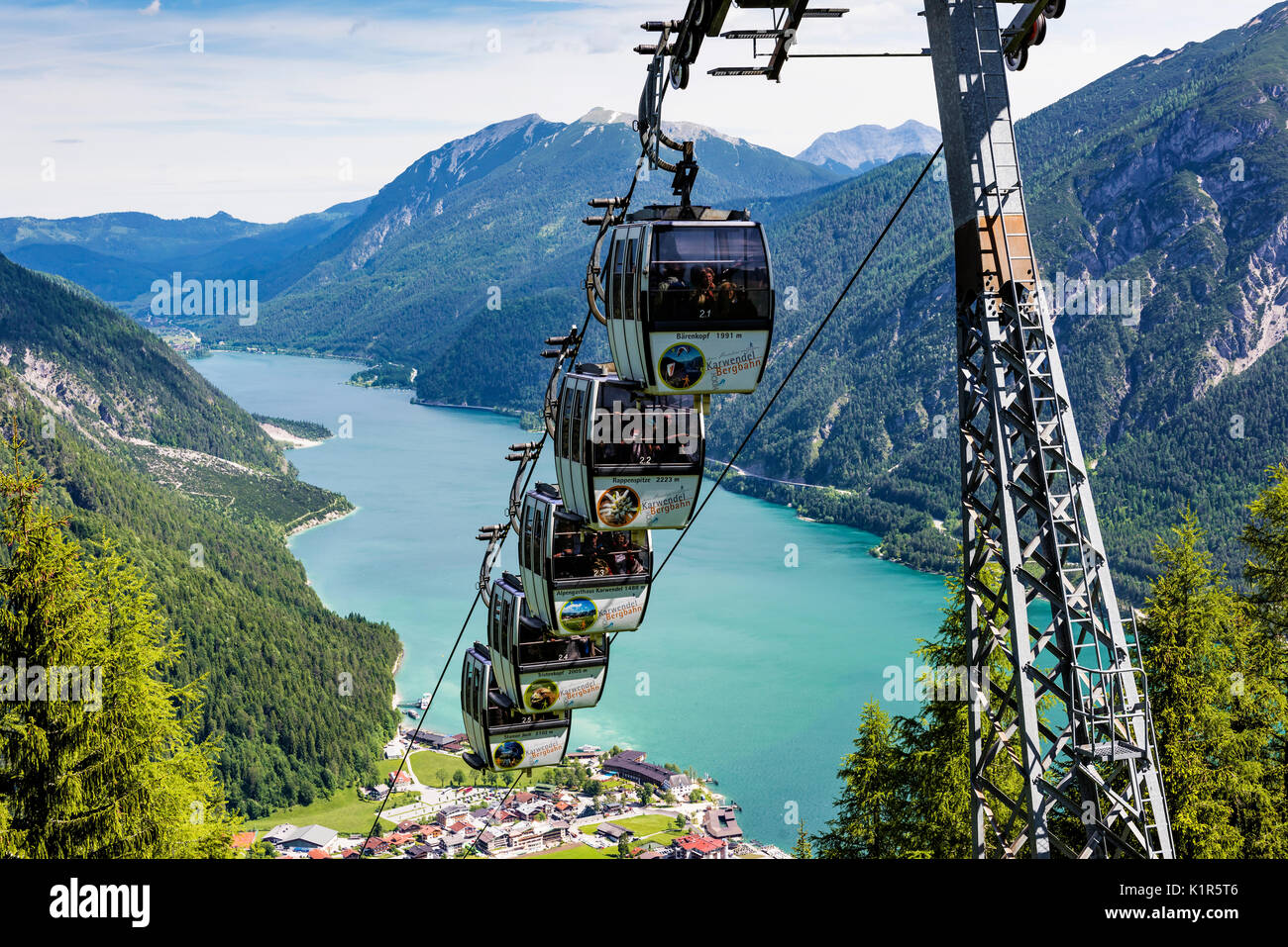 The Karwendel Cable Car above the beautiful Lake Achen. The highest lake in the Austrian Tyrol and lies north of Jenback. Stock Photo