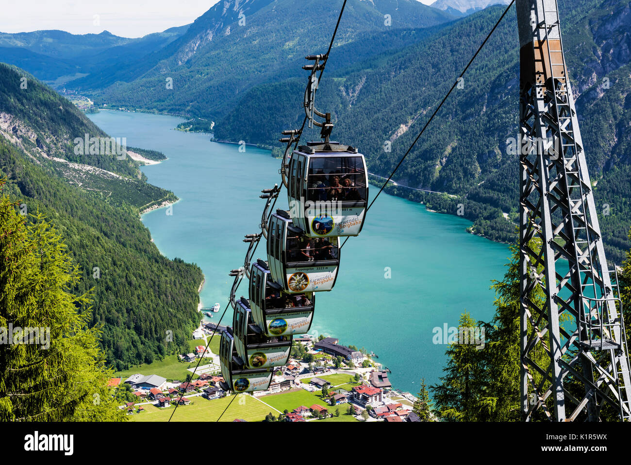 The Karwendel Cable Car above the beautiful Lake Achen. The highest lake in the Austrian Tyrol and lies north of Jenback. Stock Photo