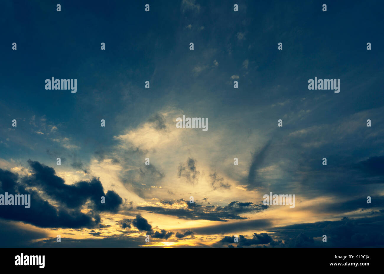 Dramatic sunset sky with clouds Stock Photo - Alamy