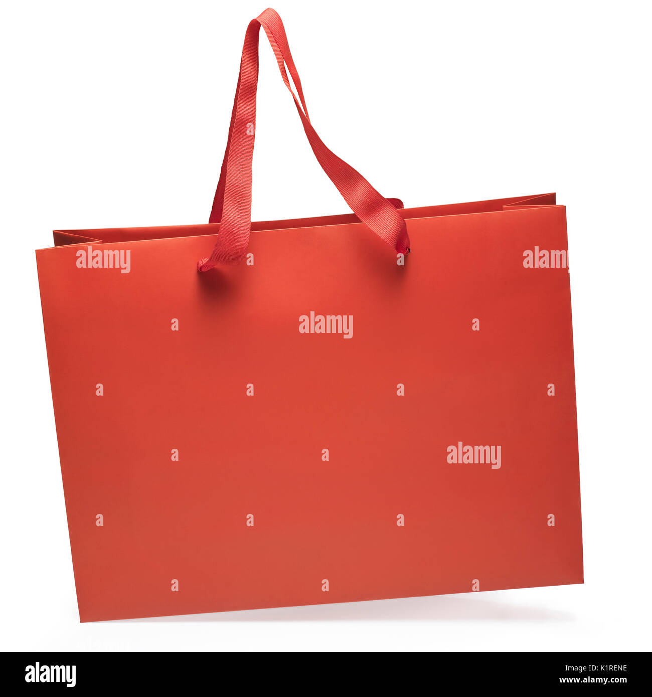 Red shopping bag opened. Clipping path Stock Photo