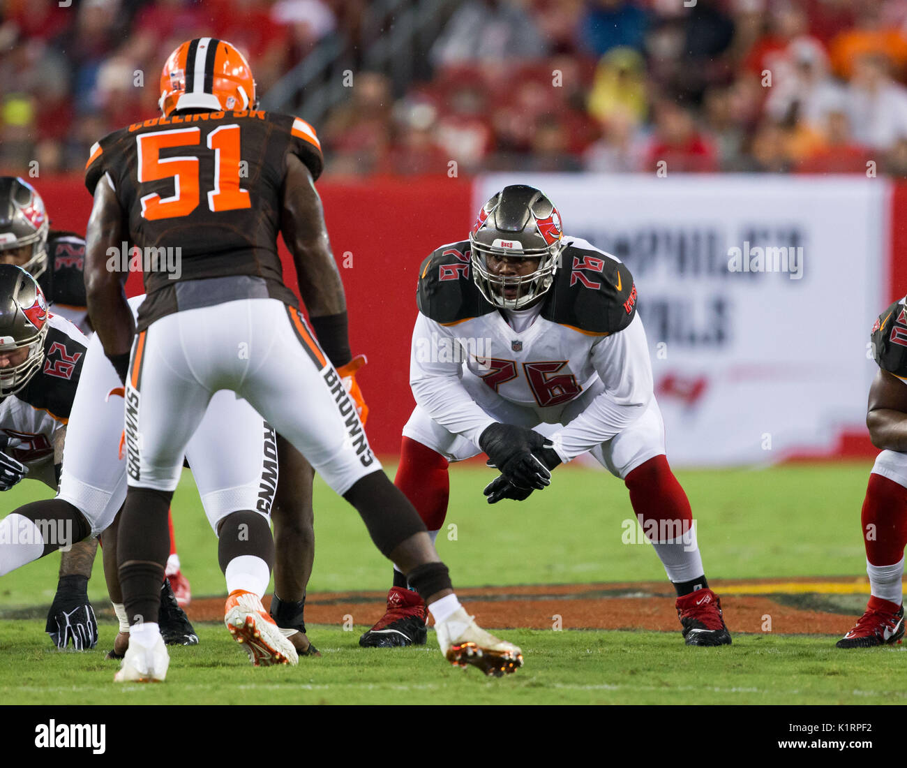 Cleveland Browns offensive tackle James Hudson III (66) walks back to the  line of scrimmage during