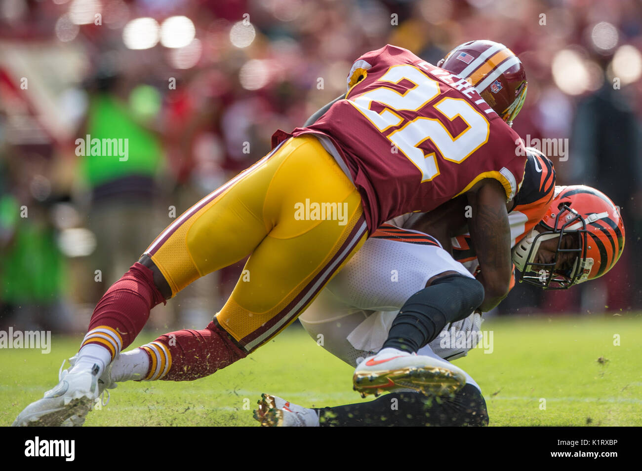 AUG 27 2017 : Washington Redskins cornerback Deshazor Everett (22) tackles Cincinnati Bengals wide receiver A.J. Green (18) in the red zone during the pre-season matchup between the Cincinnati Bengals and the Washington Redskins at FedEx Field in Landover, MD. Stock Photo