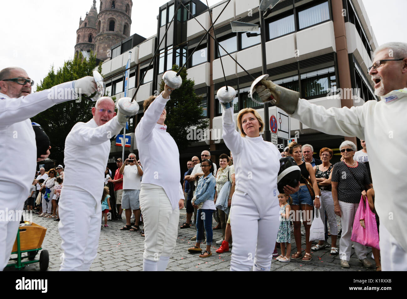 Worms, Germany. 27th August 2017. Fencers present their weapons in the parade. The first highlight of the 2017 Backfischfest was the big parade through the city of Worms with over 80 groups and floats. Community groups, music groups and business from Worms and further afield took part. Credit: Michael Debets/Alamy Live News Stock Photo