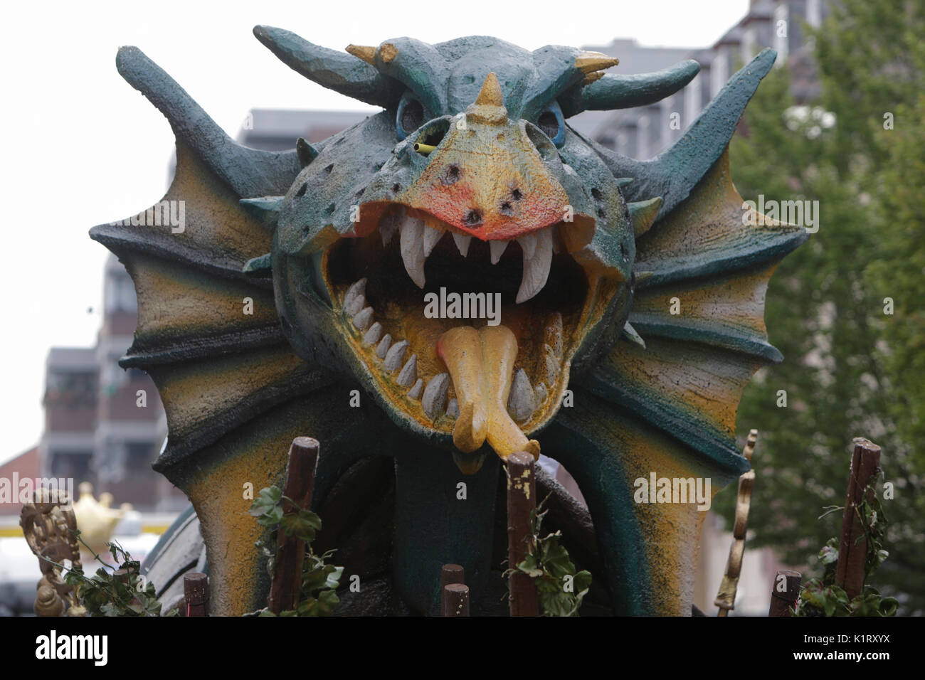 Worms, Germany. 27th August 2017. A large papier-mache dragon, the symbol of Worms, stands on a float. The first highlight of the 2017 Backfischfest was the big parade through the city of Worms with over 80 groups and floats. Community groups, music groups and business from Worms and further afield took part. Credit: Michael Debets/Alamy Live News Stock Photo