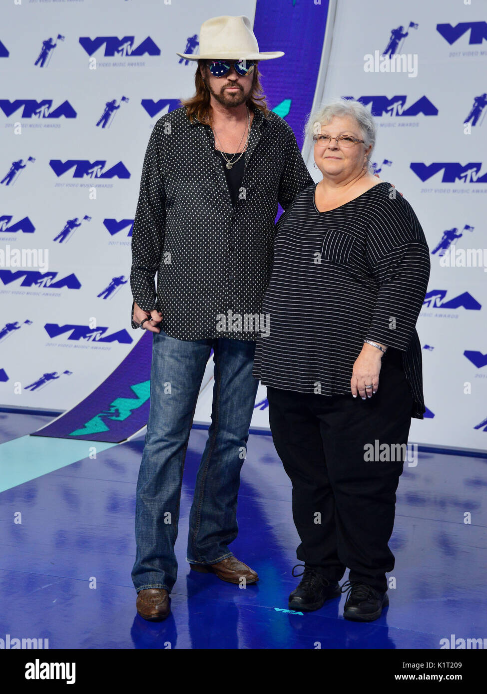 Billy Ray Cyrus and Susan Bro (mom Of Heather Heyer) arriving at the MTV VMA 2017 ( Music Awards ) at the Great Western Forum in Los Angeles. August 27, 2017. Stock Photo