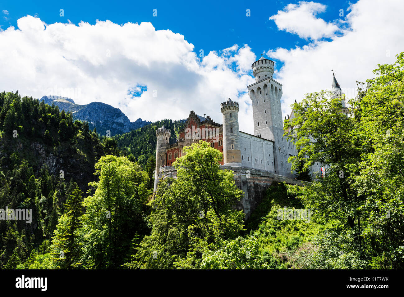 Neuschwanstein Castle is a very famous castle position on a hill above the German town of Hohenschwangau near Fussen in the bavarian area of Germany Stock Photo