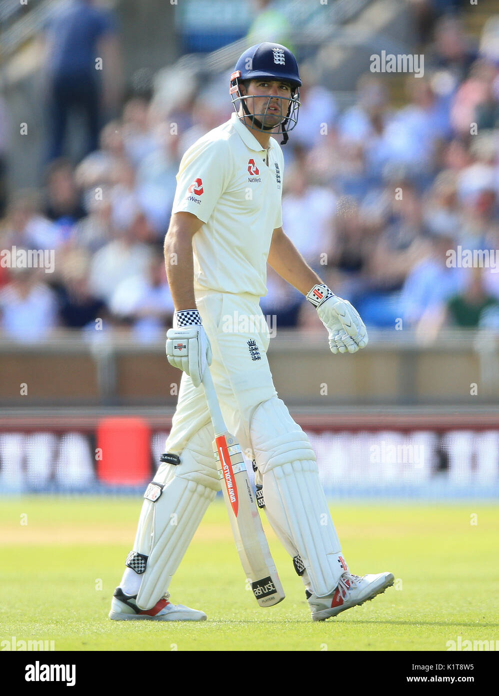 England's Alistair Cook walks off after being dismissed during day ...