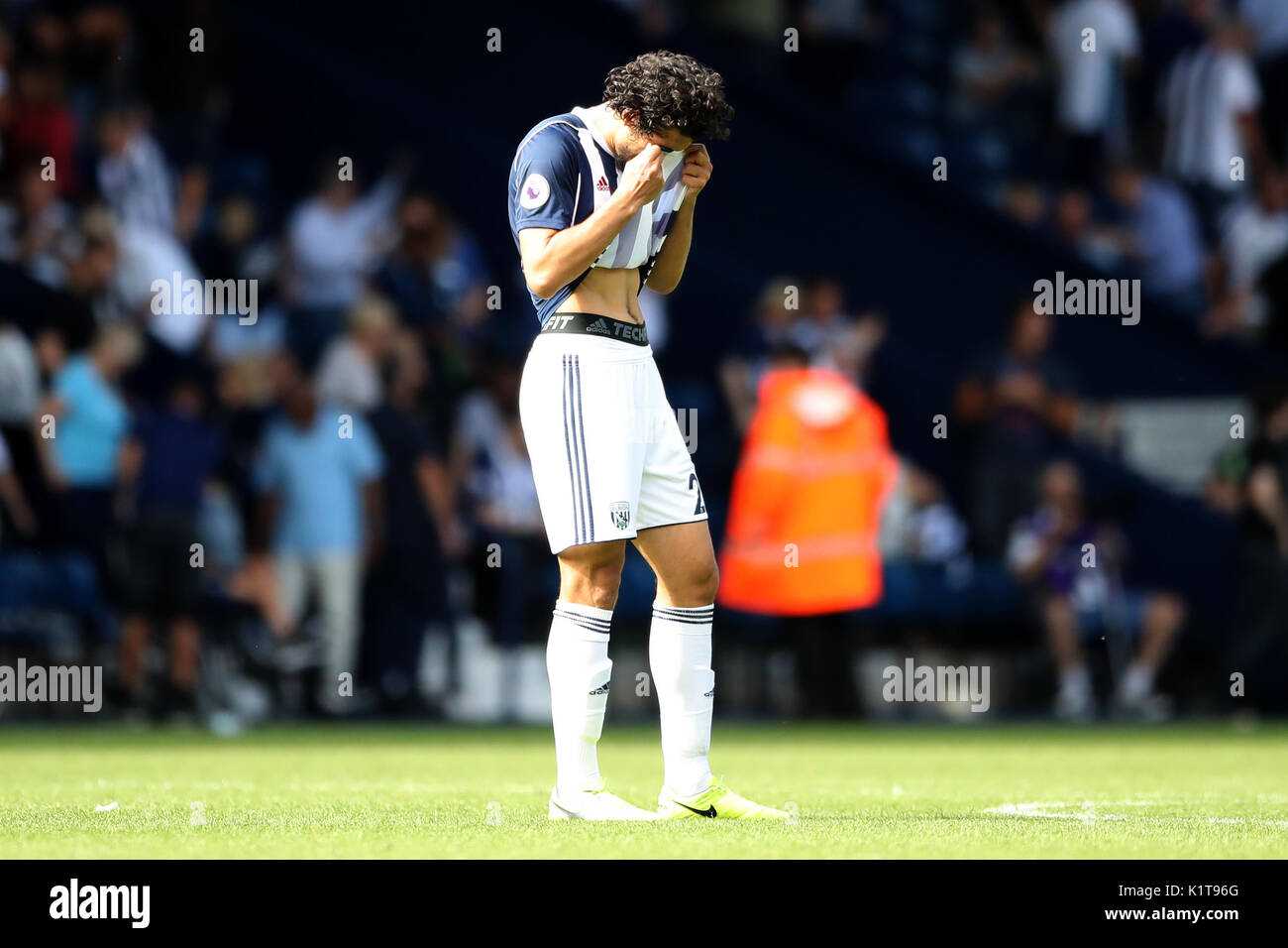 West Bromwich Albion's Ahmed Hegazy shows his frustration after the final whistle of the Premier League match at The Hawthorns, West Bromwich. Stock Photo