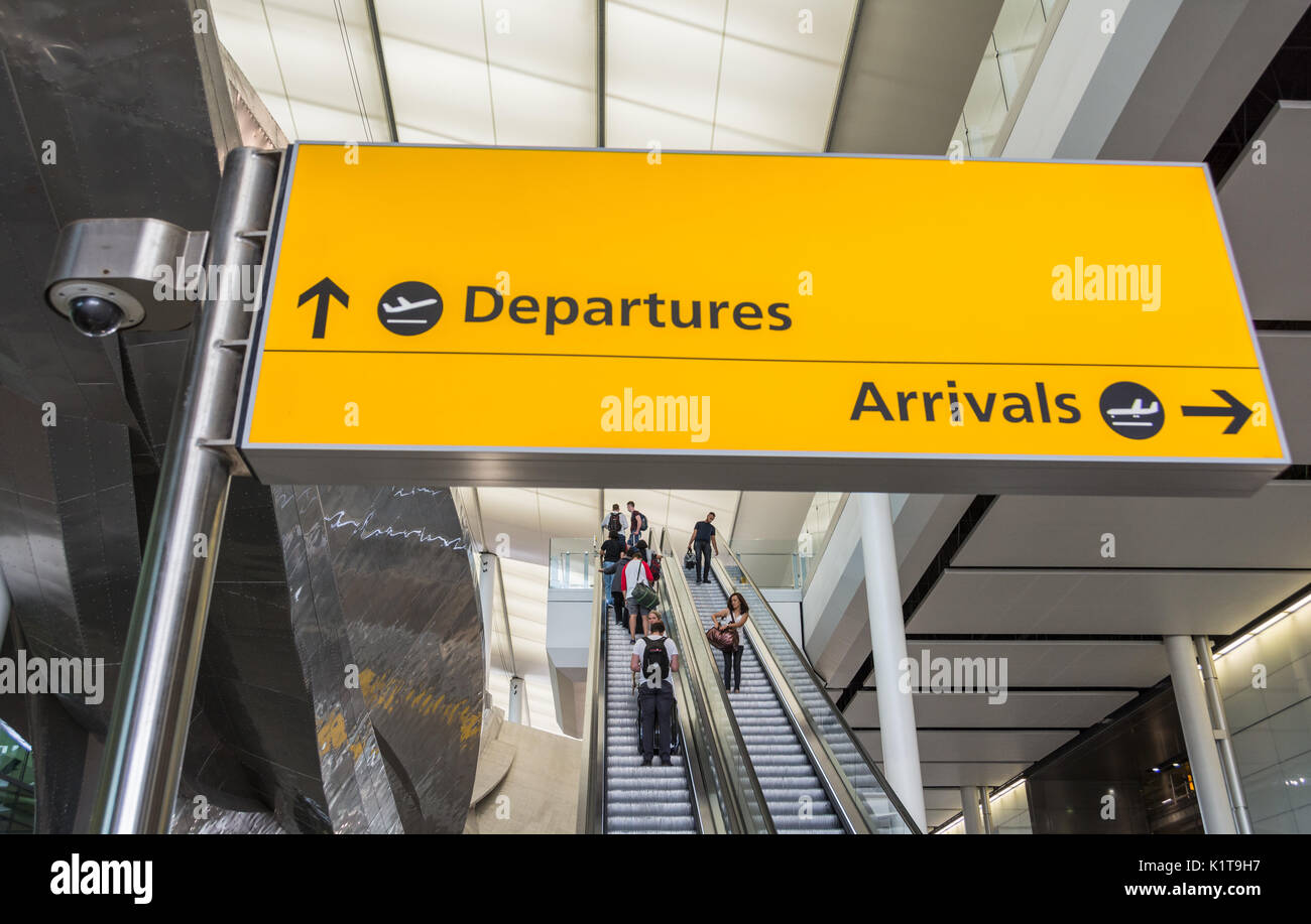 Arrivals and Departures signage at Heathrow Airport Terminal Two Building, London, UK Stock Photo