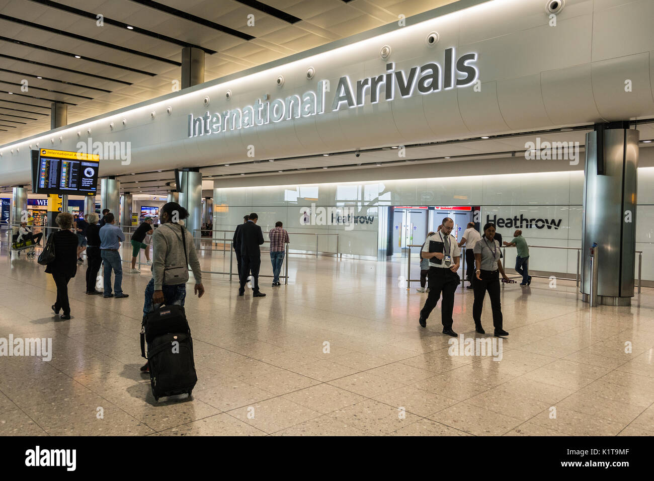 International Arrivals lounge at the Queen's Terminal, Heathrow Airport Terminal Two Building, London, UK Stock Photo