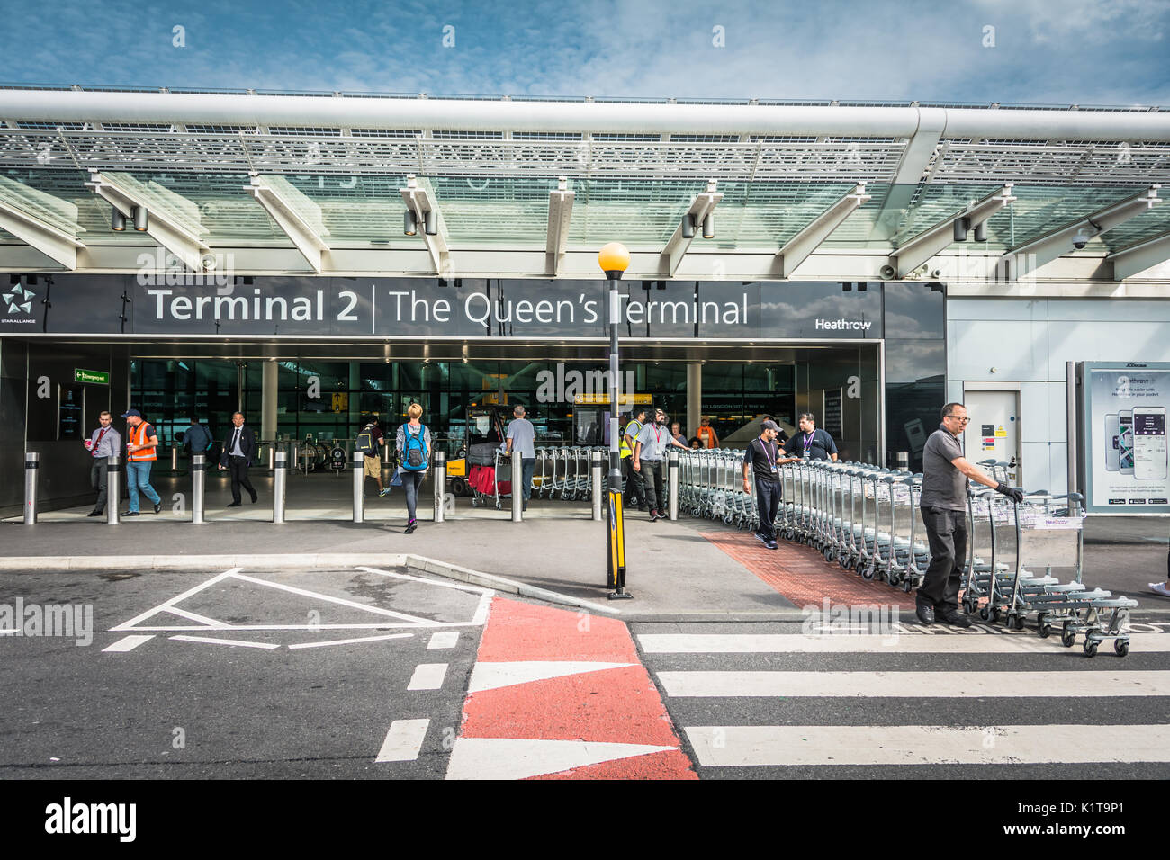 Luggage trolleys outside Heathrow Airport Terminal Two Building, London