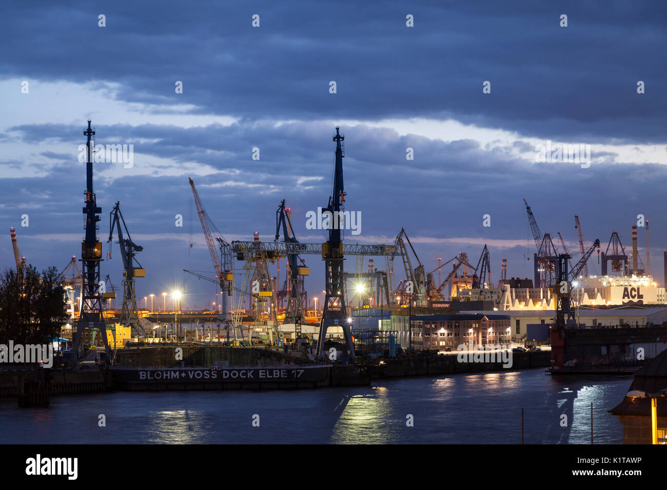 Hamburg containerport at sunset Stock Photo