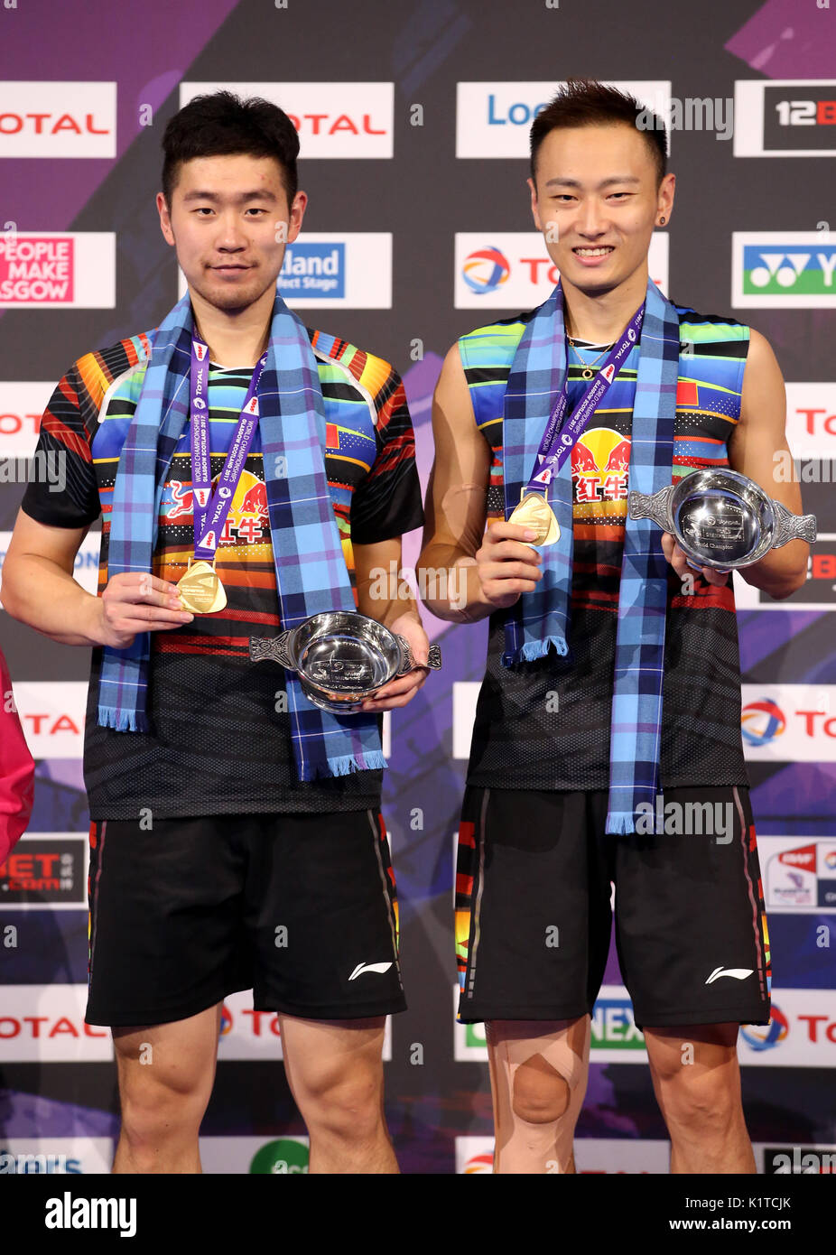China's Liu Cheng (left) and Zhang Nan on the podium after winning gold