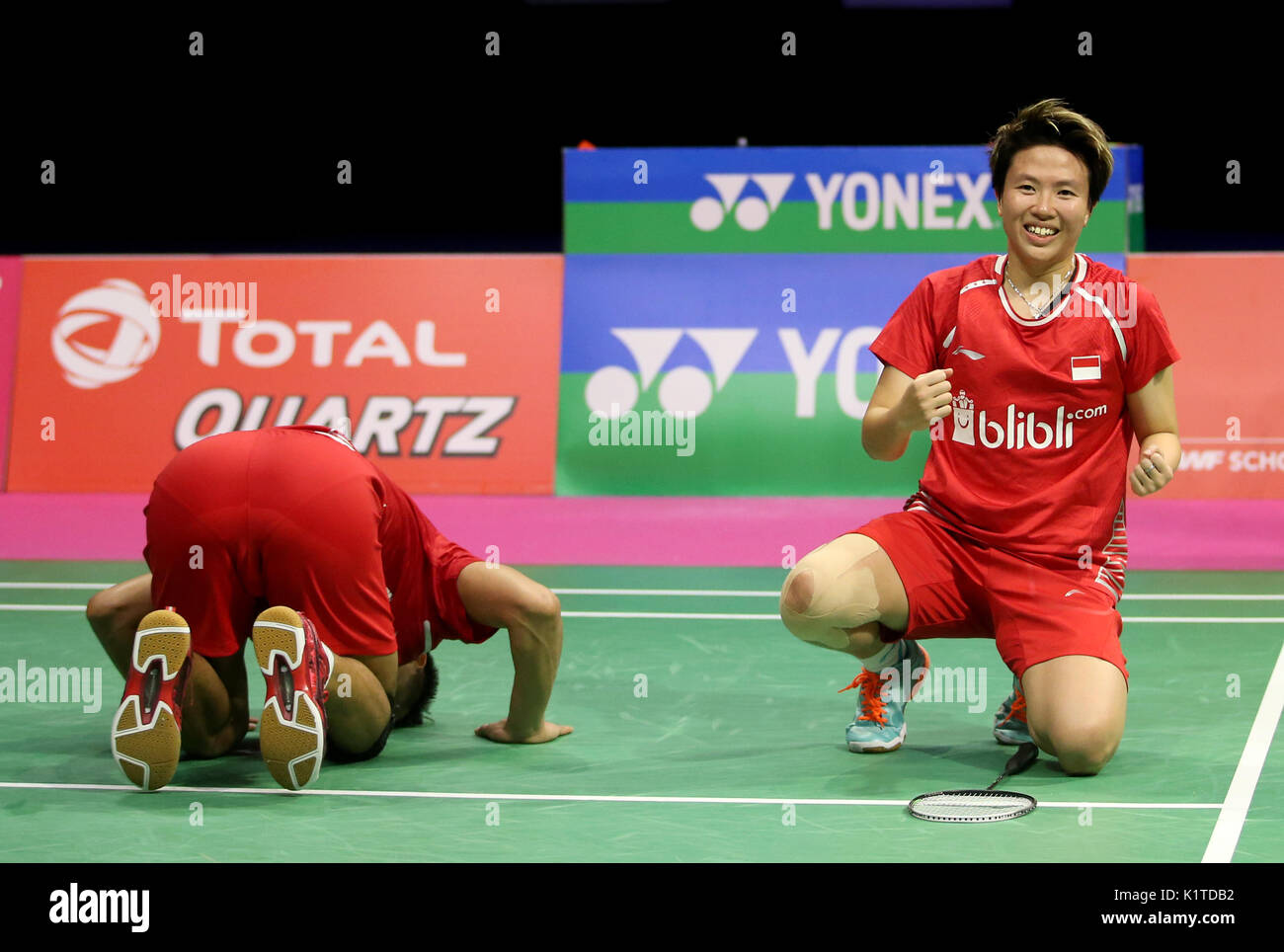 Indonesia's Tontowi Ahmad (left) and Liliyana Natsir celebrate after  winning gold in the mixed doubles final on day seven of the 2017 BWF World  Championships at the Emirates Arena, Glasgow Stock Photo -