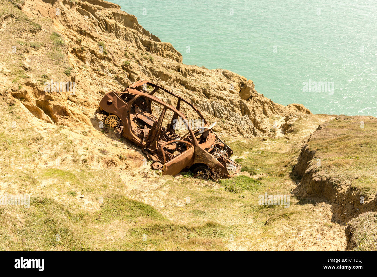 Dumped and burnt out car Harbour Heights, Newhaven, East Sussex, UK