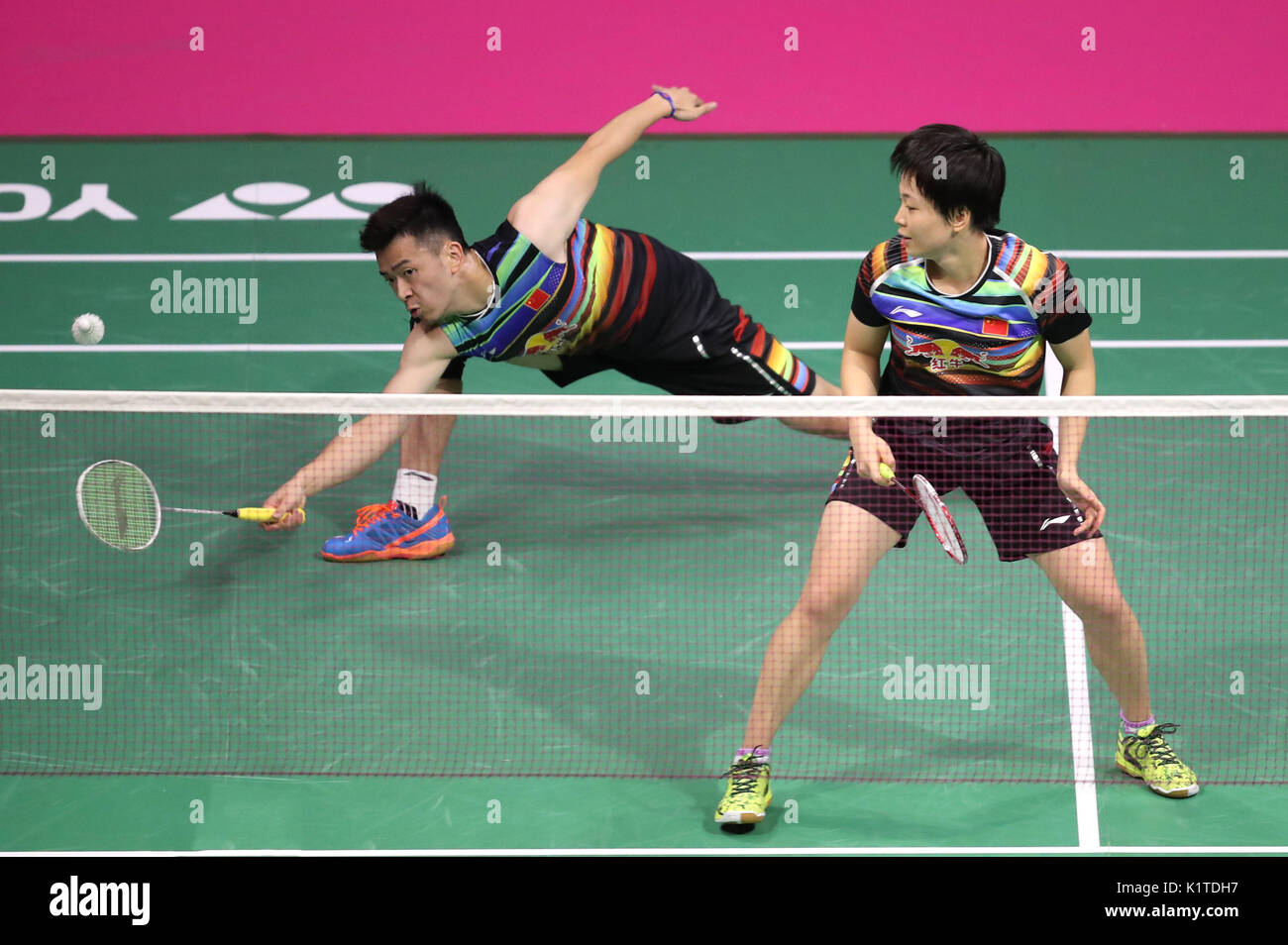 China's Zheng Siwei (left) and Chen Qingchen in the mixed doubles final ...