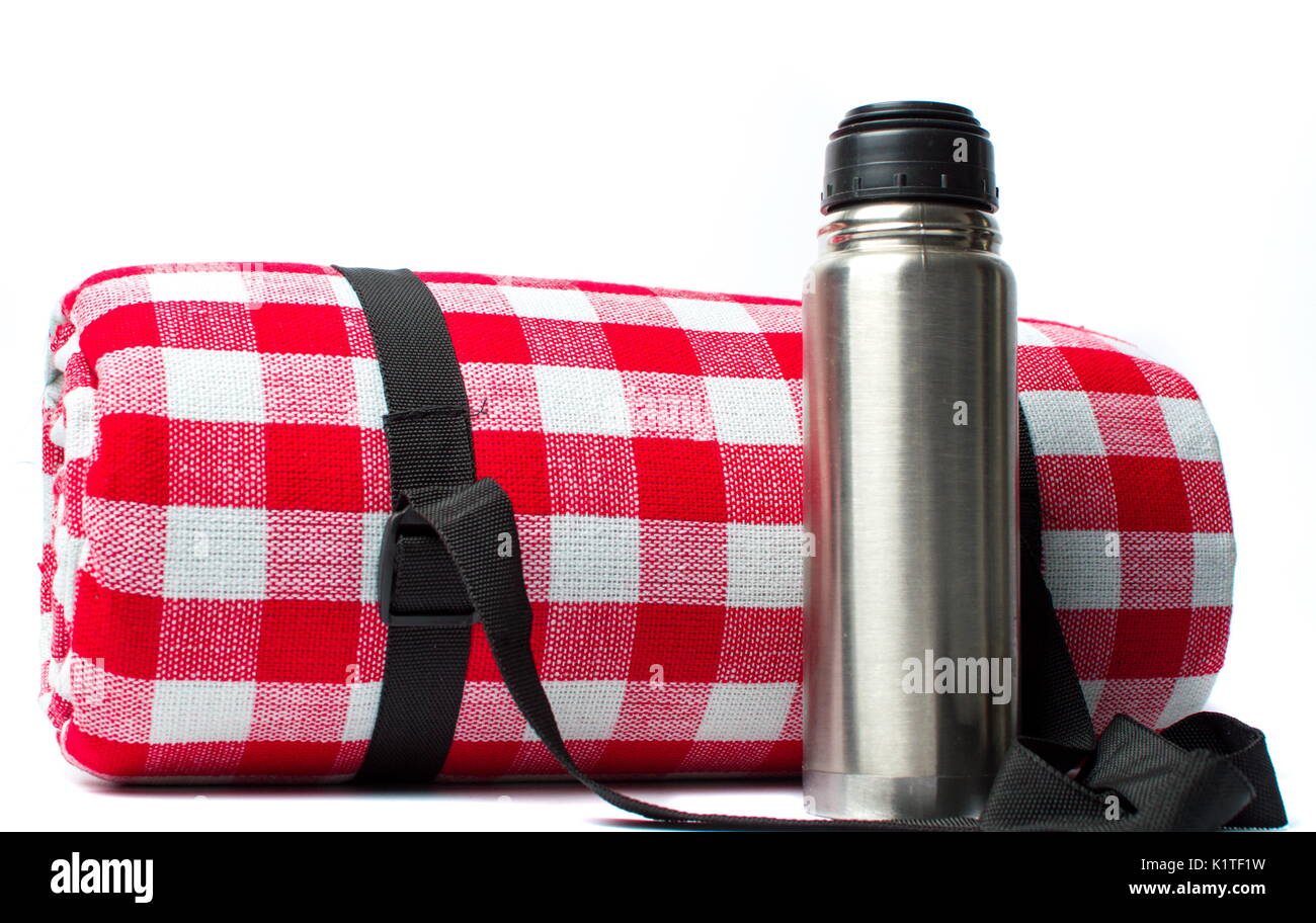 Picnic blanket and a thermos isolated on white background Stock Photo