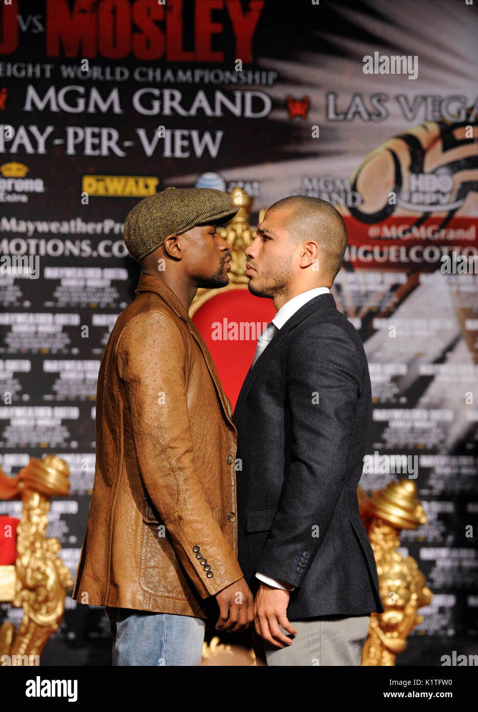 US boxer Floyd Mayweather (L) WBA Super Welterweight World Champion Miguel Cotto Puerto Rico faceoff during press conference Grauman's Chinese Theatre Hollywood March 1,2012. Mayweather Cotto will meet WBA Super Welterweight World Championship fight May 5 MGM Grand Las Vegas. Stock Photo