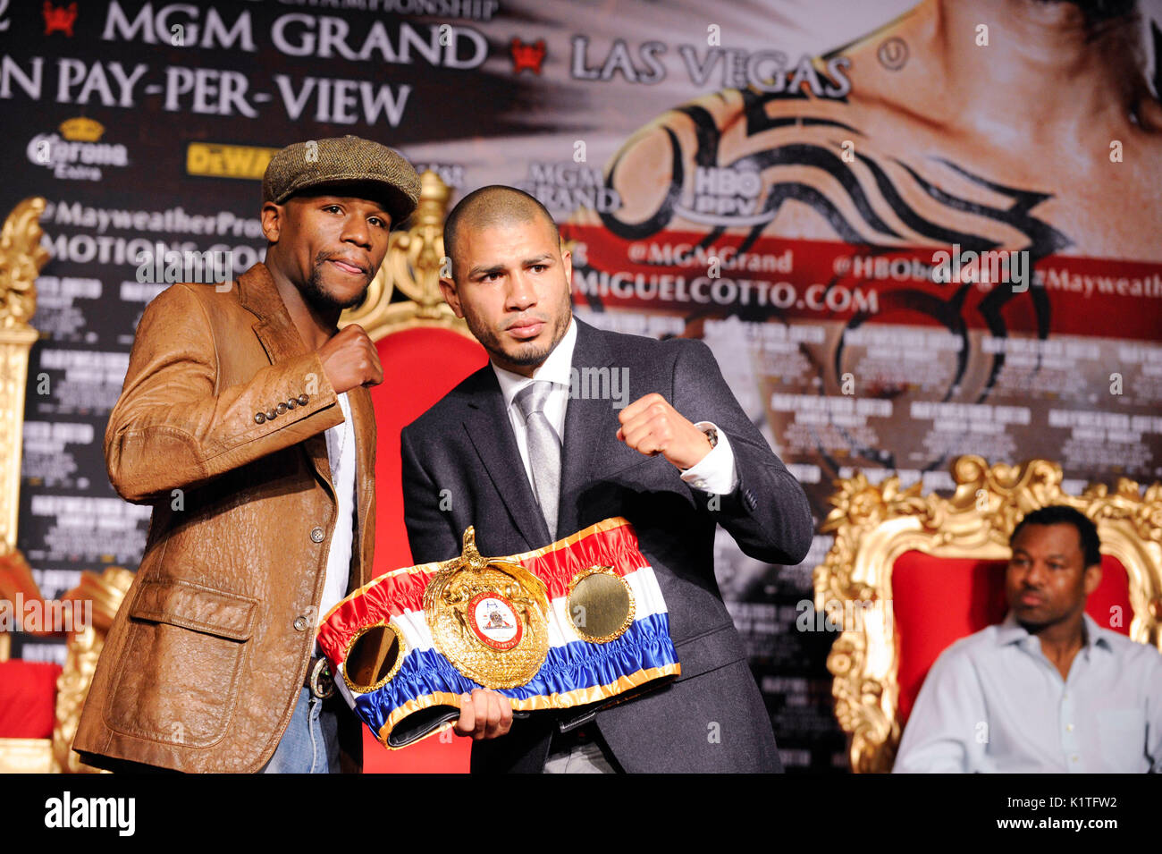 US boxer Floyd Mayweather (L) WBA Super Welterweight World Champion Miguel Cotto Puerto Rico during press conference Grauman's Chinese Theatre Hollywood March 1,2012. Mayweather Cotto will meet WBA Super Welterweight World Championship fight May 5 MGM Grand Las Vegas. Stock Photo