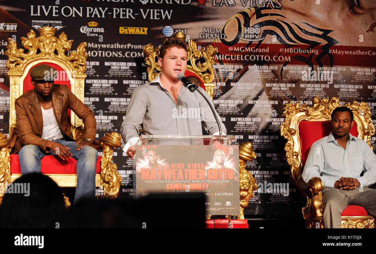 (L-R) Boxers Floyd Mayweather,Canelo Alvarez Shane Mosley attend press conference Grauman's Chinese Theatre Hollywood March 1,2012. Mayweather Cotto will meet WBA Super Welterweight World Championship fight May 5 MGM Grand Las Vegas. Stock Photo