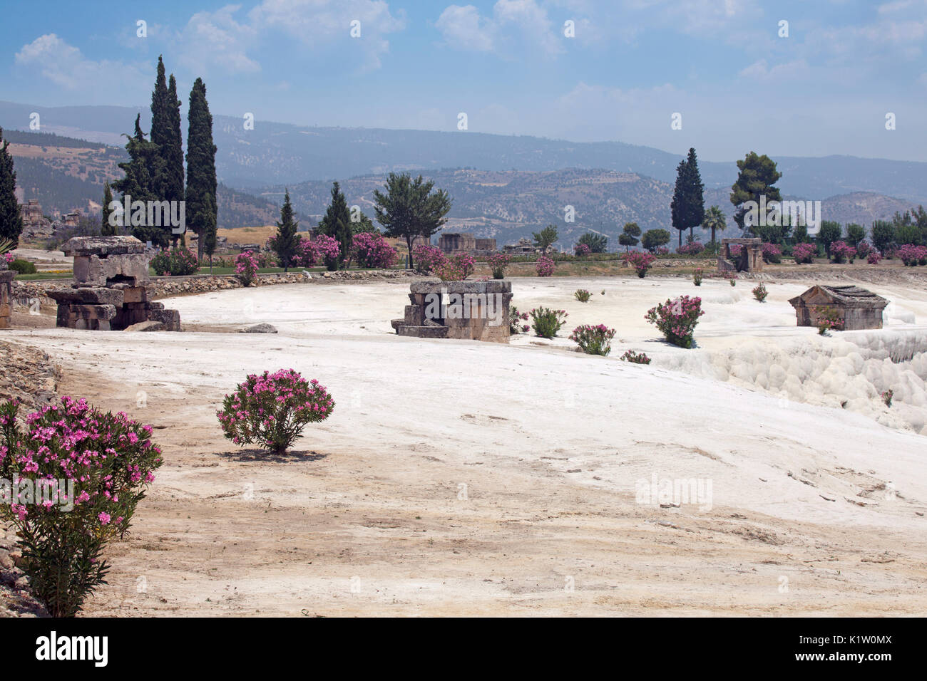 Image of part of the ruins of Hierapolis built on top of the Pamukkale formations. Stock Photo