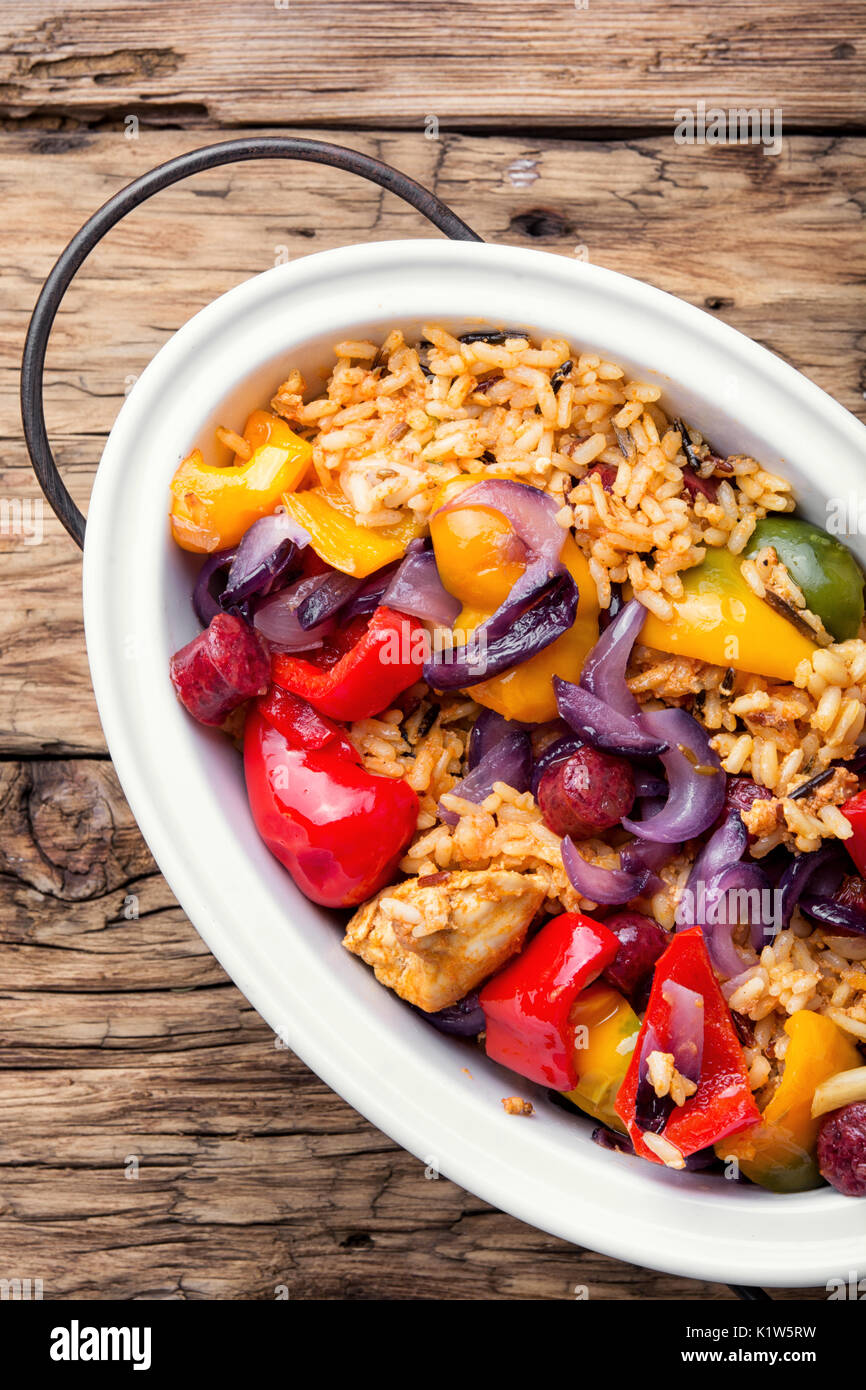ceramic bowl with Jambalaya with chicken and sausage with hot spices