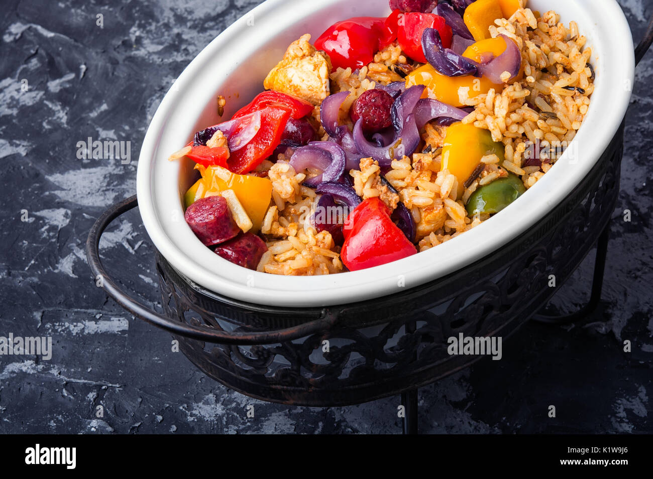 ceramic bowl with Jambalaya with chicken and sausage with hot spices