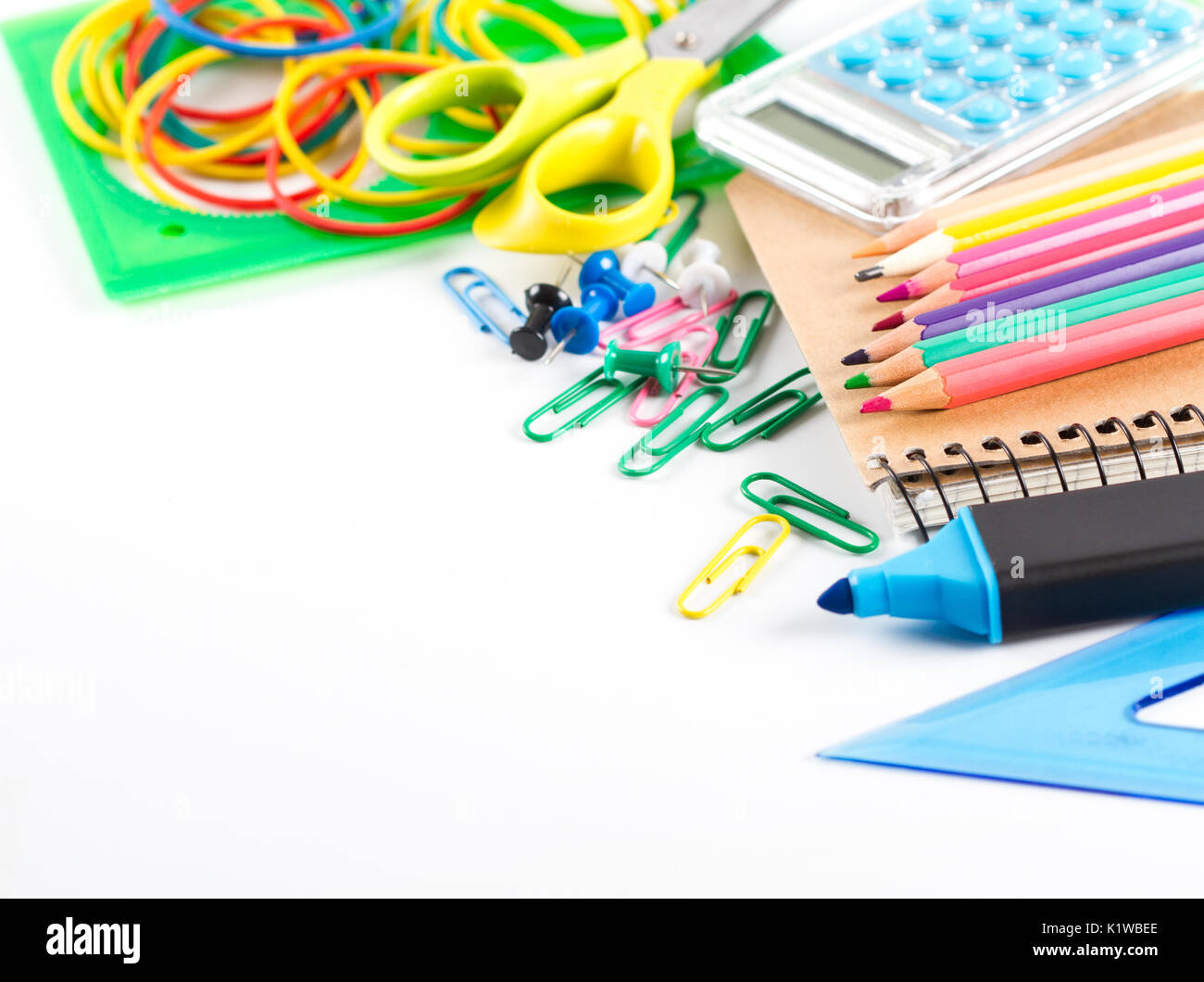 Assortment of school supplies on white background Stock Photo - Alamy