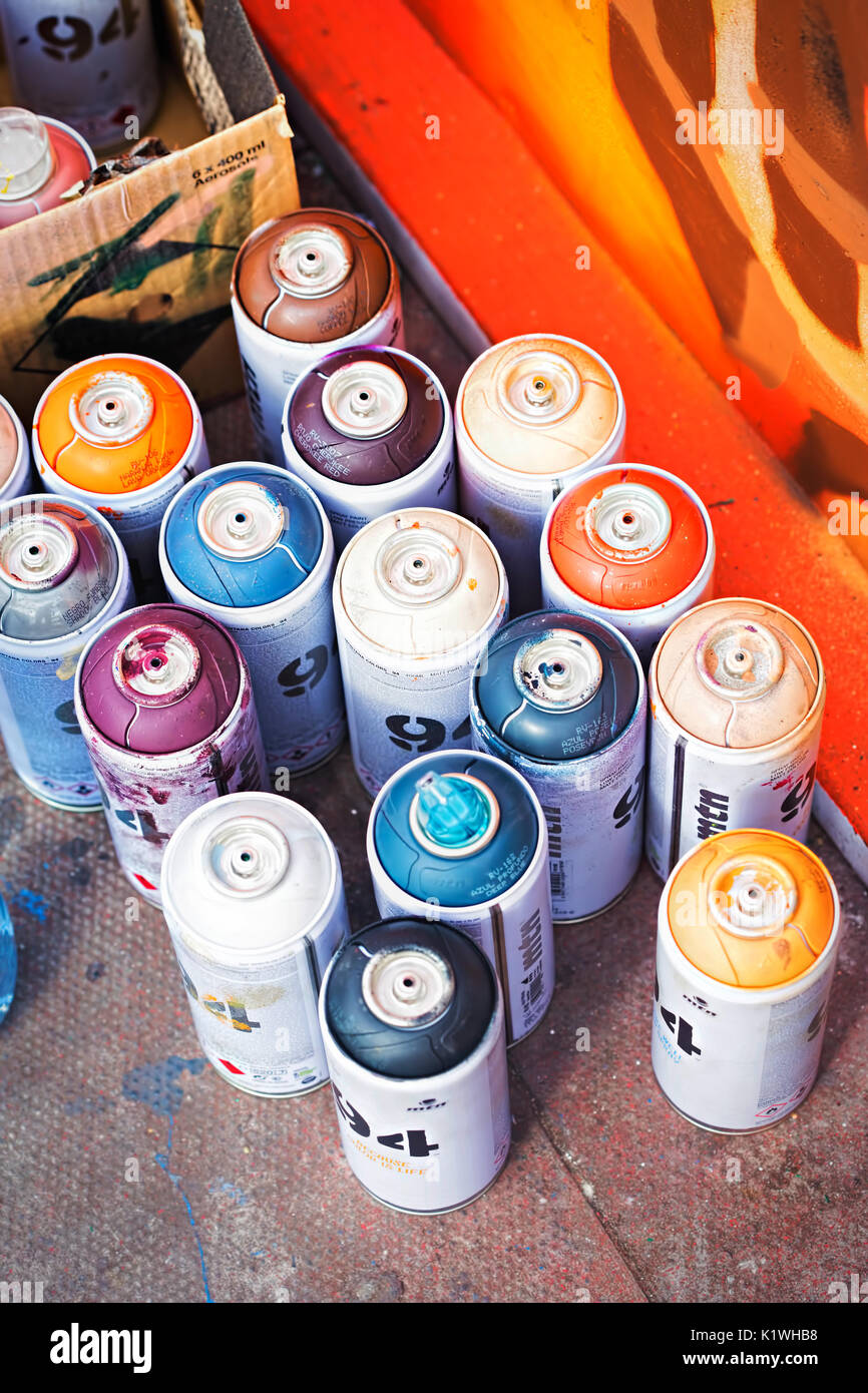 Colourful aerosol spray paint cans by graffiti Stock Photo Alamy