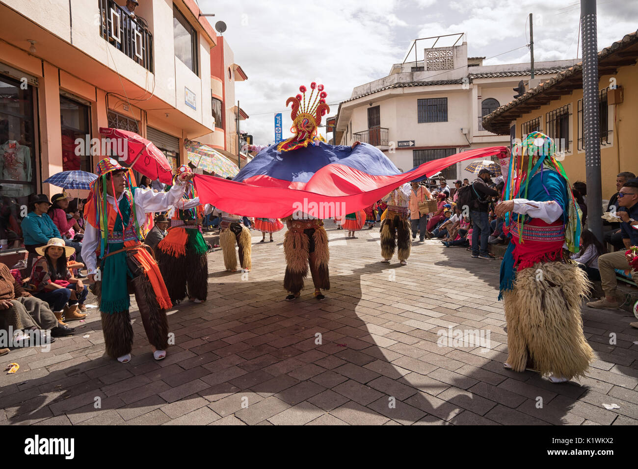 June 17, 2017 Pujili, Ecuador: street dancers performing in traditional clothing during Corpus Christi Stock Photo