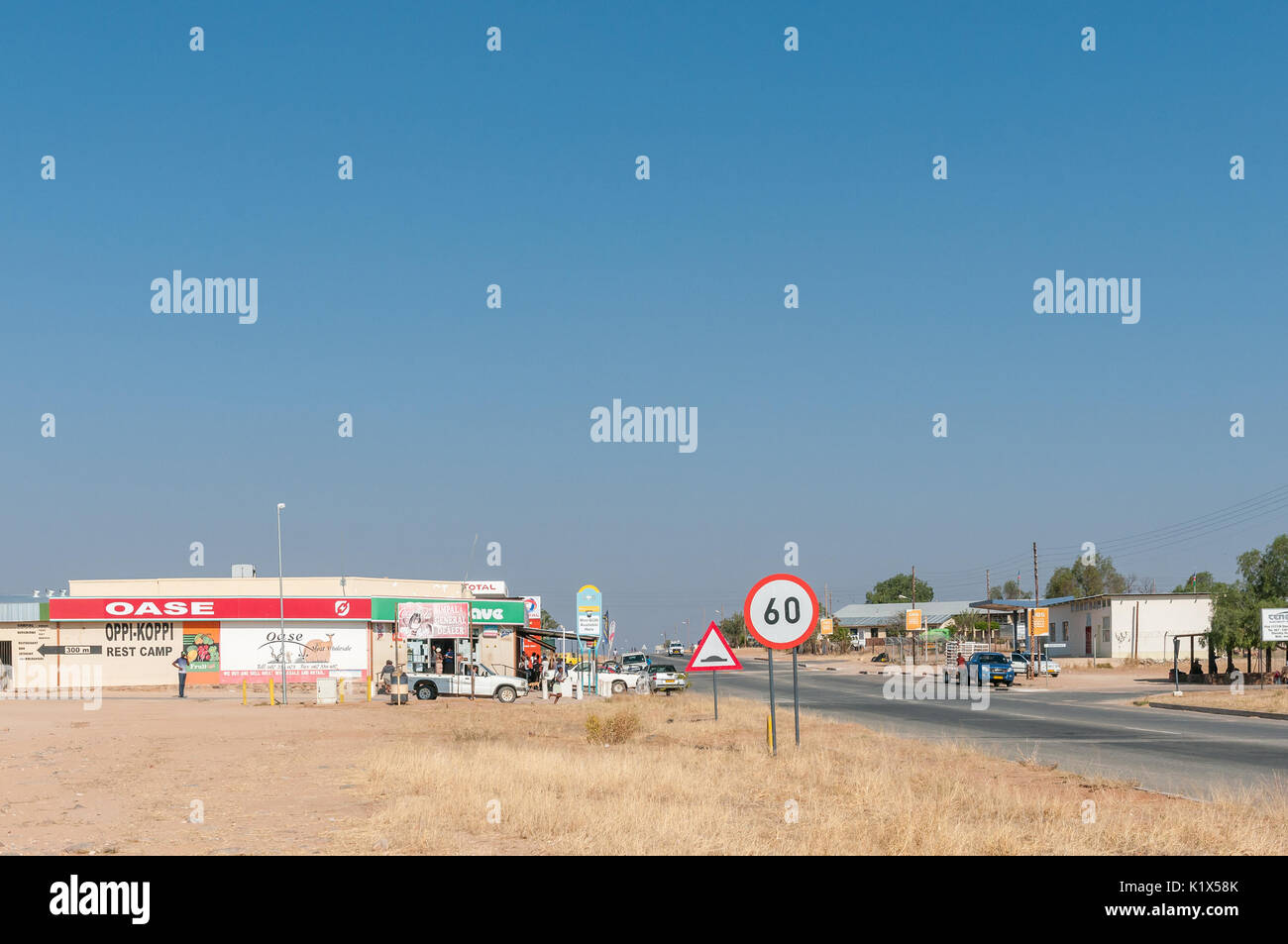 KAMANJAB, NAMIBIA - JUNE 27, 2017: A street scene with businesses and vehicles in Kamanjab, a small town in the Kunene Region of Namibia Stock Photo