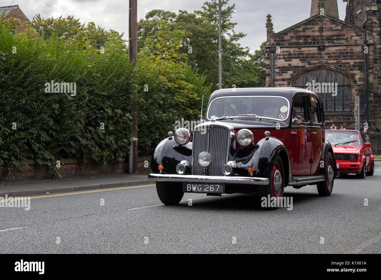 1948 40s forties Black ROVER 75 300 2103 cc,  Vintage, British classic cars from all eras of motoring lined up on town centre streets and in Coronation Park for people to admire. Stock Photo