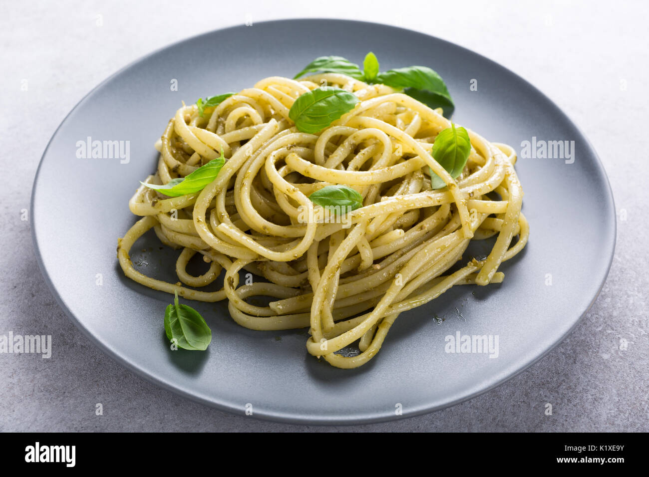 Linguine with green pesto Stock Photo Alamy